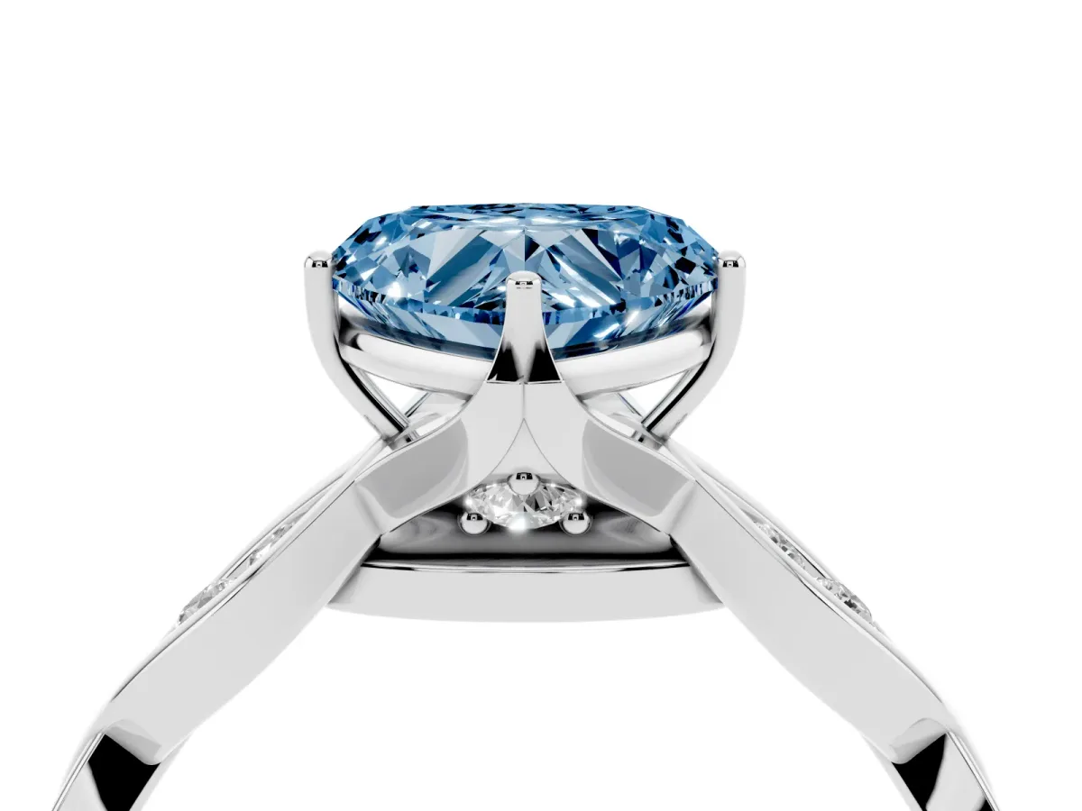 Fancy Blue Heart Cut Solitaire Twist Band with Leaf Prong Setting Platinum