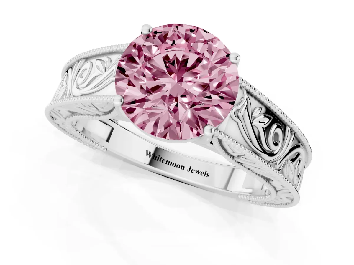 Fancy Pink Round Cut Diamond Solitaire Ring with Engraved Band and Four-Prong Setting White gold