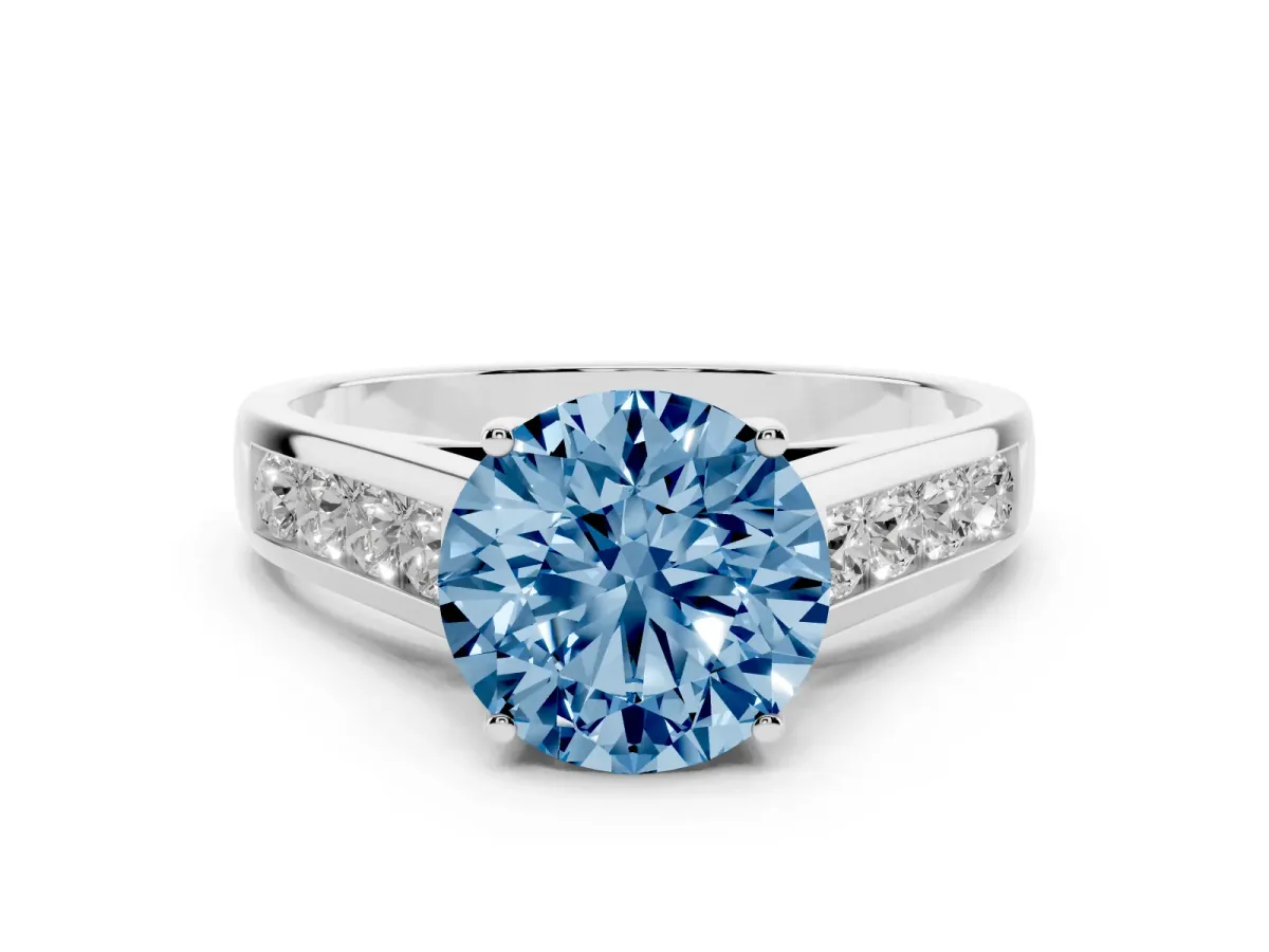 Fancy Blue Round Cut Solitaire Channel-Set Diamond Engagement Ring with Four-Prong Setting Silver