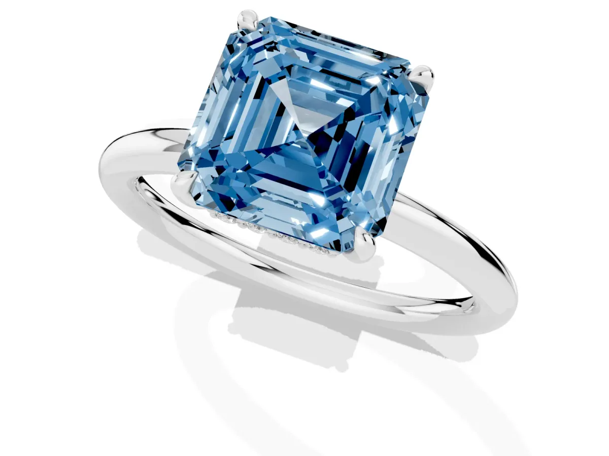 Fancy Blue Asscher Cut Diamond Solitaire Ring with Thin Band and Four-Prong Setting Silver
