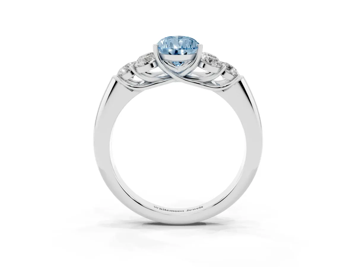 Fancy Blue Pear Cut Cut Diamond Cluster Ring with Round Accent Stones and Prong Setting on a Classic Band White gold