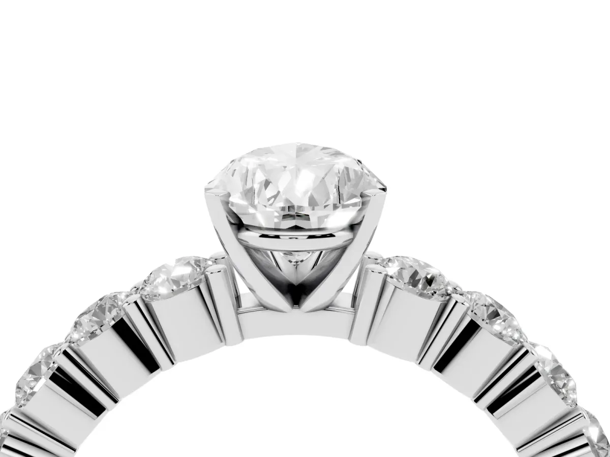 Pear Cut Diamond Solitaire Ring with Shared Prong Round Side Stones White gold