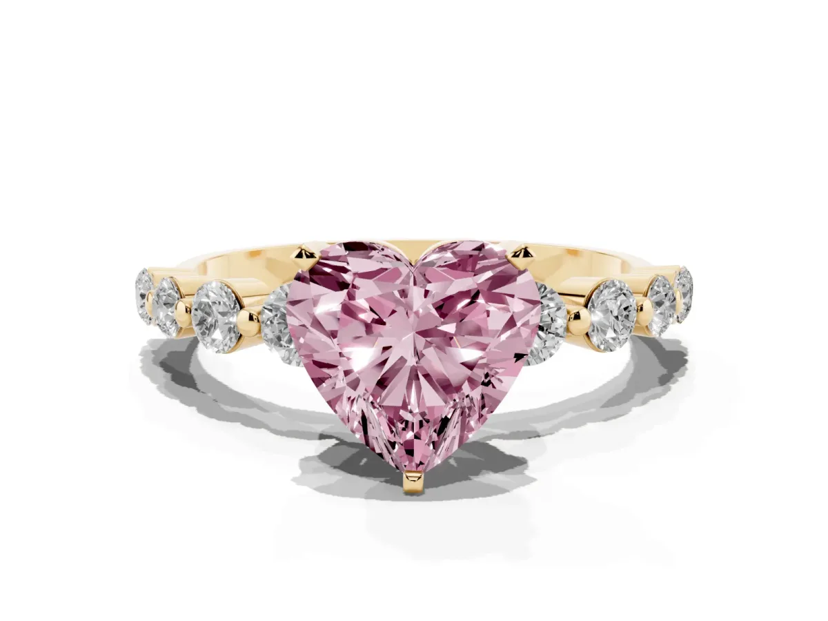 Fancy Pink Heart Cut Solitaire Diamond Ring with Pave Band and Four-Prong Setting Yellow gold