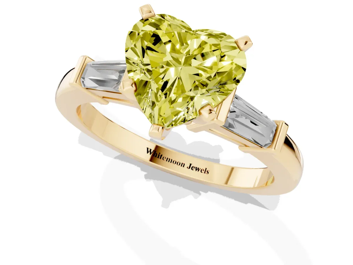Fancy Yellow Heart Cut Cut Diamond Solitaire Ring with Tapered Baguette Accents and Four-Prong Setting Yellow gold