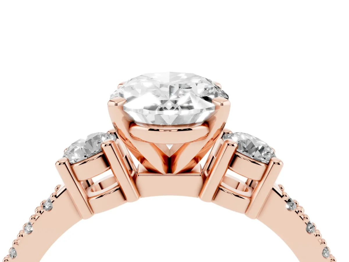 Oval Cut Three-Stone Diamond Pavé Band with Prong Setting Rose gold