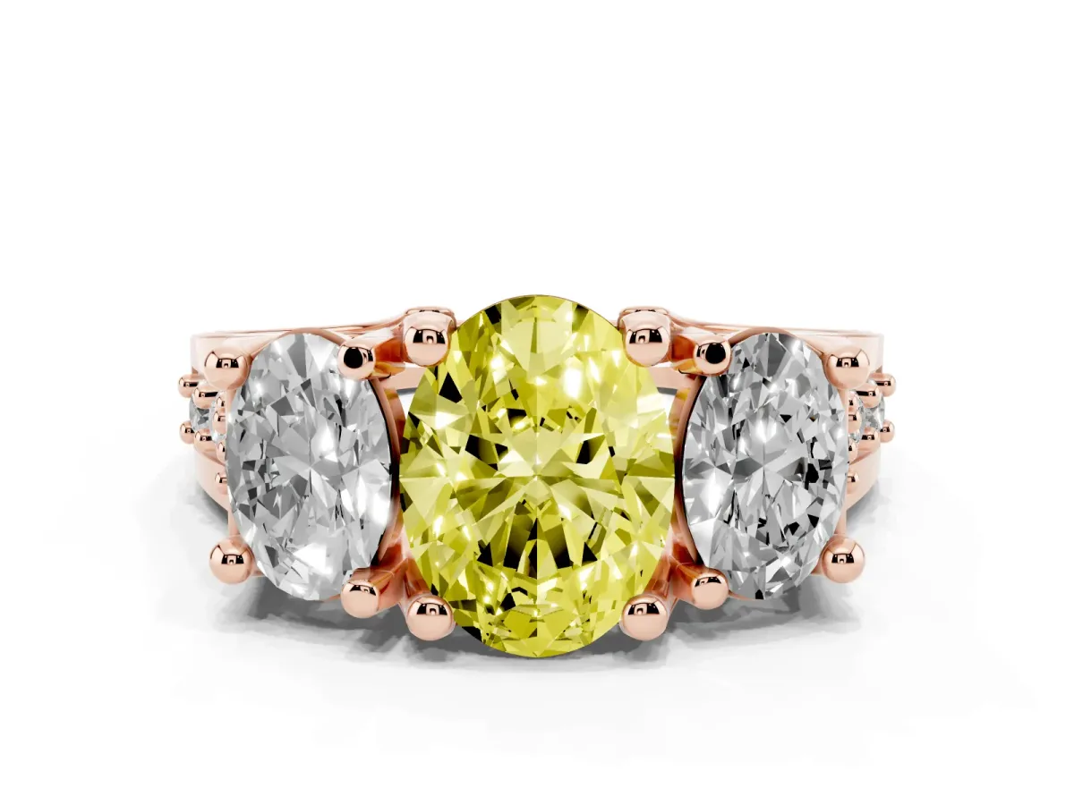 Fancy Yellow Oval Cut Diamond Three-Stone Ring with Channel Set Band and Four-Prong Setting Rose gold