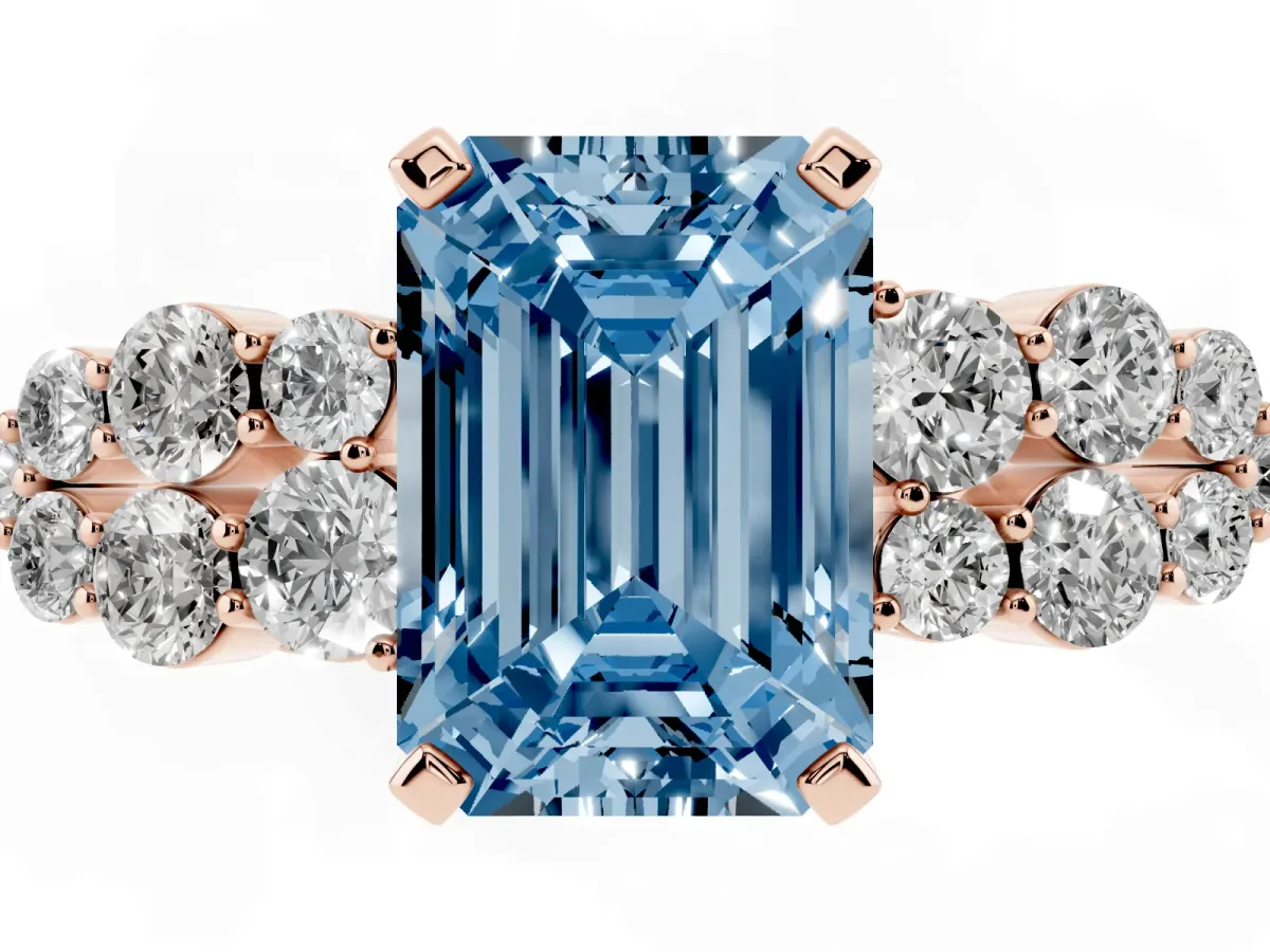 Fancy Blue Emerald Cut Cluster Diamond Engagement Ring with Pavé Band and Four-Prong Setting Rose gold