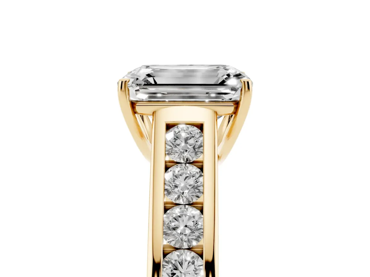 Emerald Cut Brilliant Channel-Set Solitaire Ring with Four-Prong Setting Yellow gold