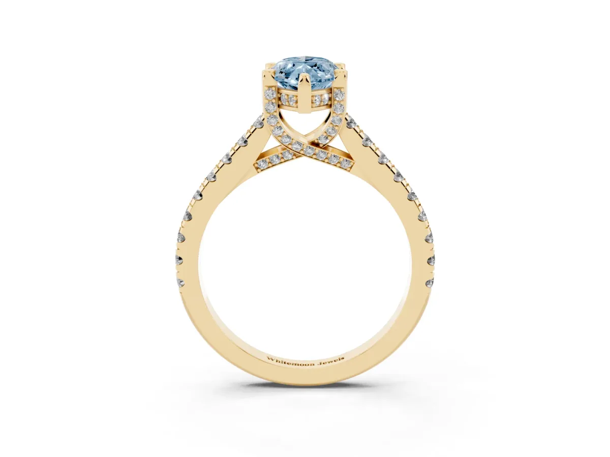 Fancy Blue Marquise Cut Brilliant Diamond Solitaire with Pavé Band and Four-Prong Setting Yellow gold