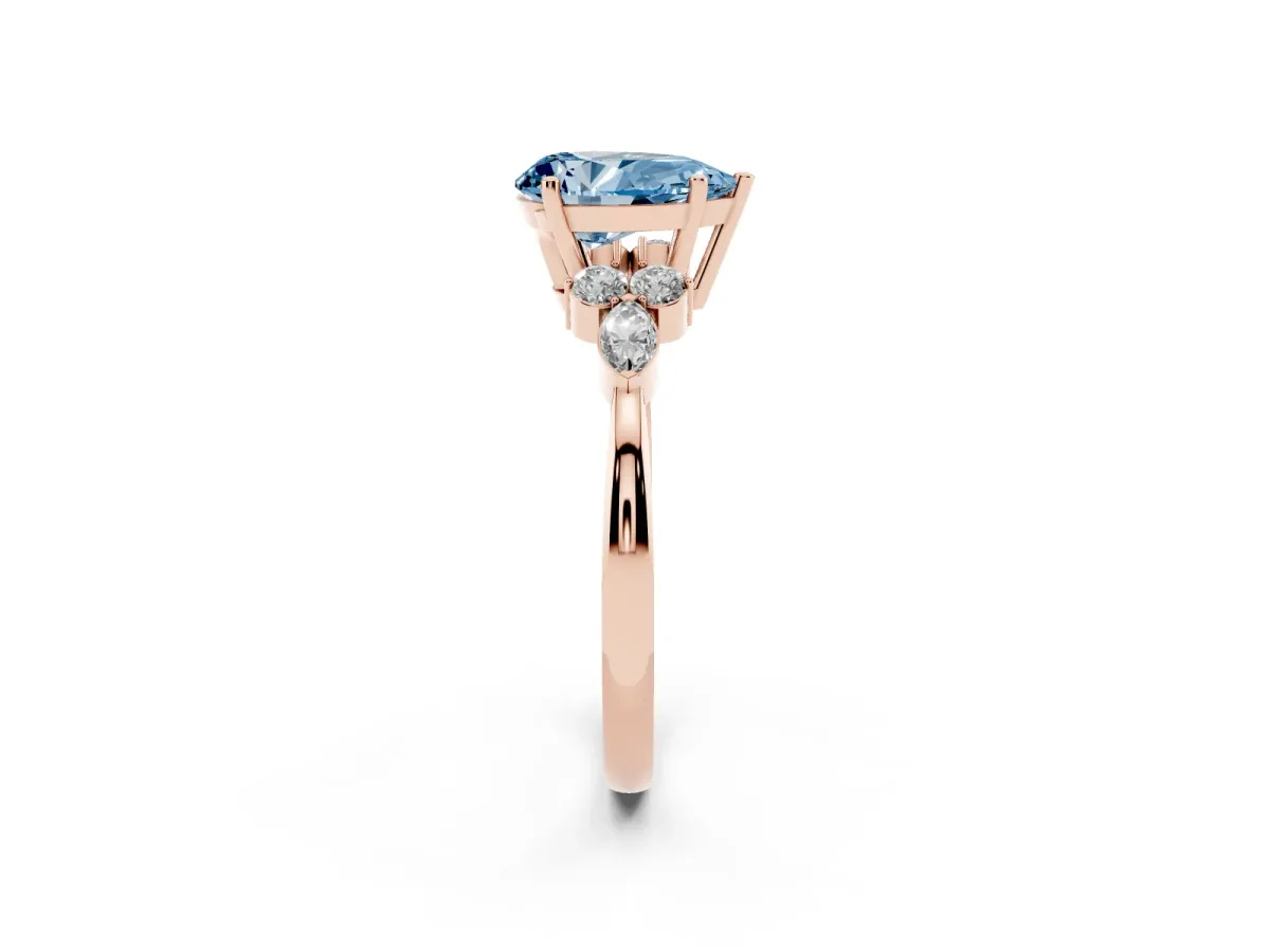 Fancy Blue Pear Cut Brilliant Diamond Solitaire Ring with Pear Side Stones and Four-Prong Setting Rose gold