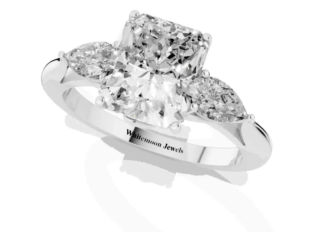 Three-Stone Radiant Cut Brilliant Diamond Solitaire Ring with Tapered Band and Four-Prong Setting Platinum