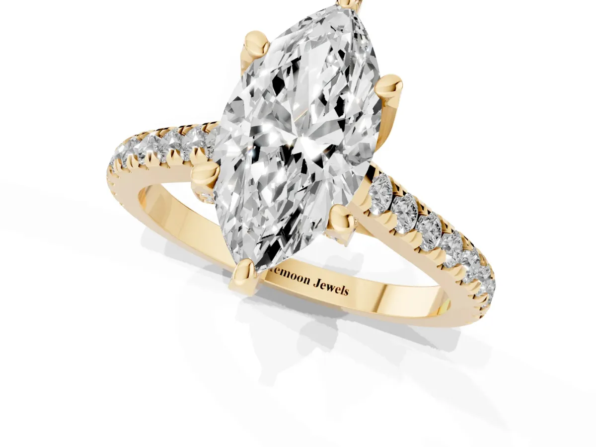 Marquise Cut Brilliant Diamond Solitaire with Pavé Band and Four-Prong Setting Yellow gold