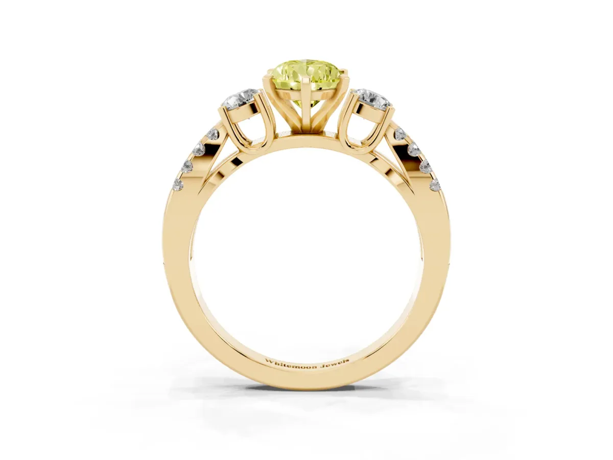 Fancy Yellow Pear Cut Diamond Three-Stone Ring with Pavé Split Shank and Four-Prong Setting Yellow gold
