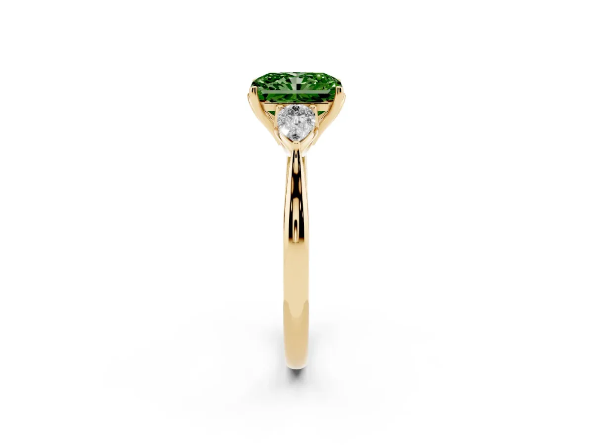 Fancy Green Three-Stone Radiant Cut Diamond Ring with Pear Side Stones in Four-Prong Setting Yellow gold