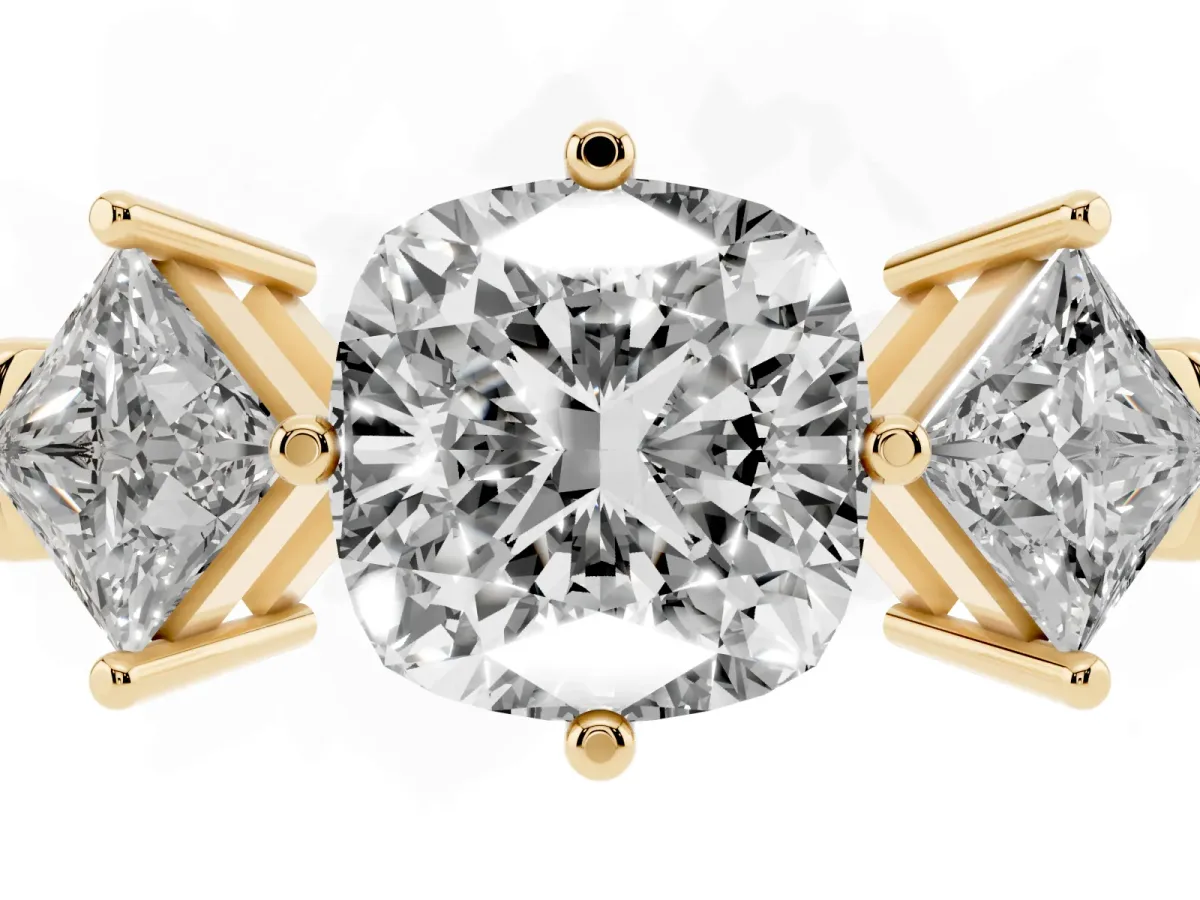 Three-Stone Cushion Cut and Princess Cut Diamond Ring with Channel Band and Four-Prong Setting Yellow gold