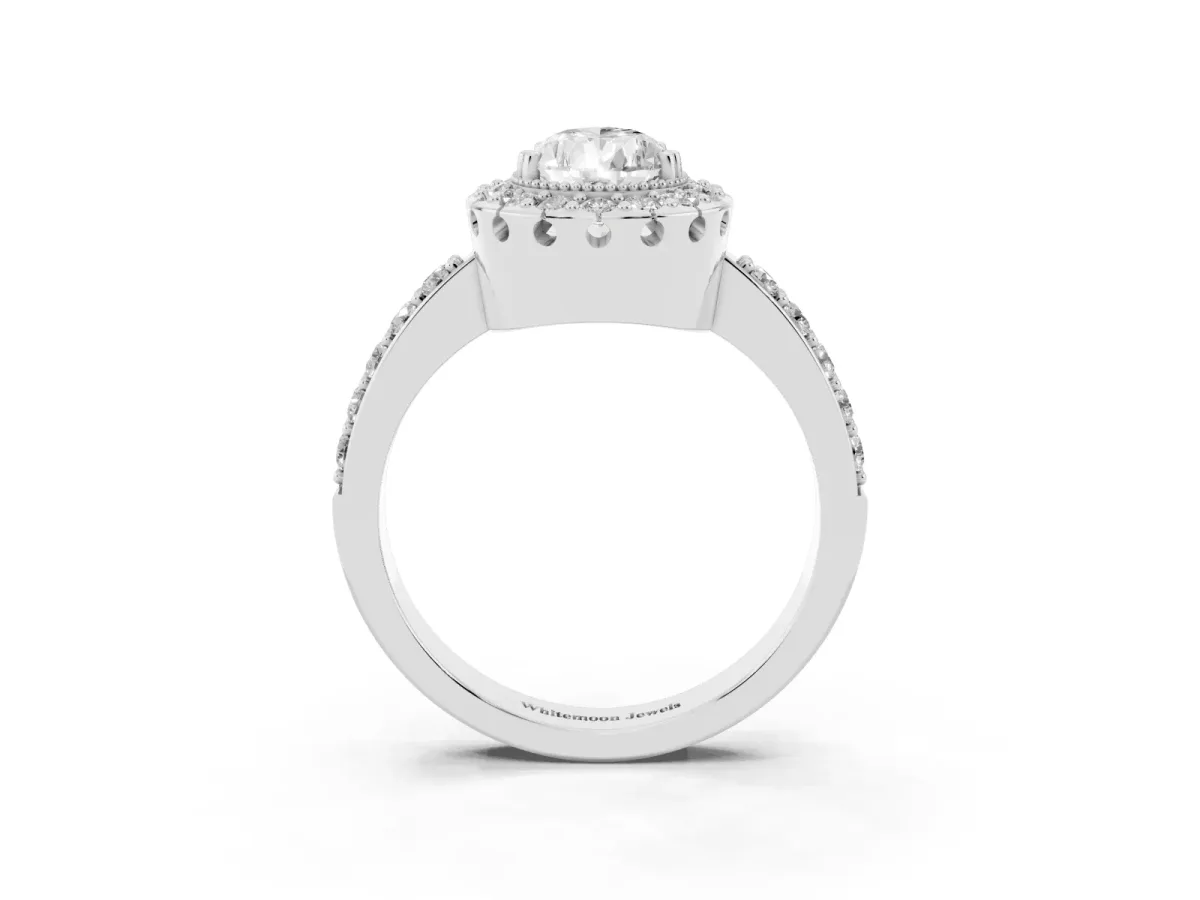 Pear Cut Diamond Halo Ring with Pavé Band and Prong Setting Silver