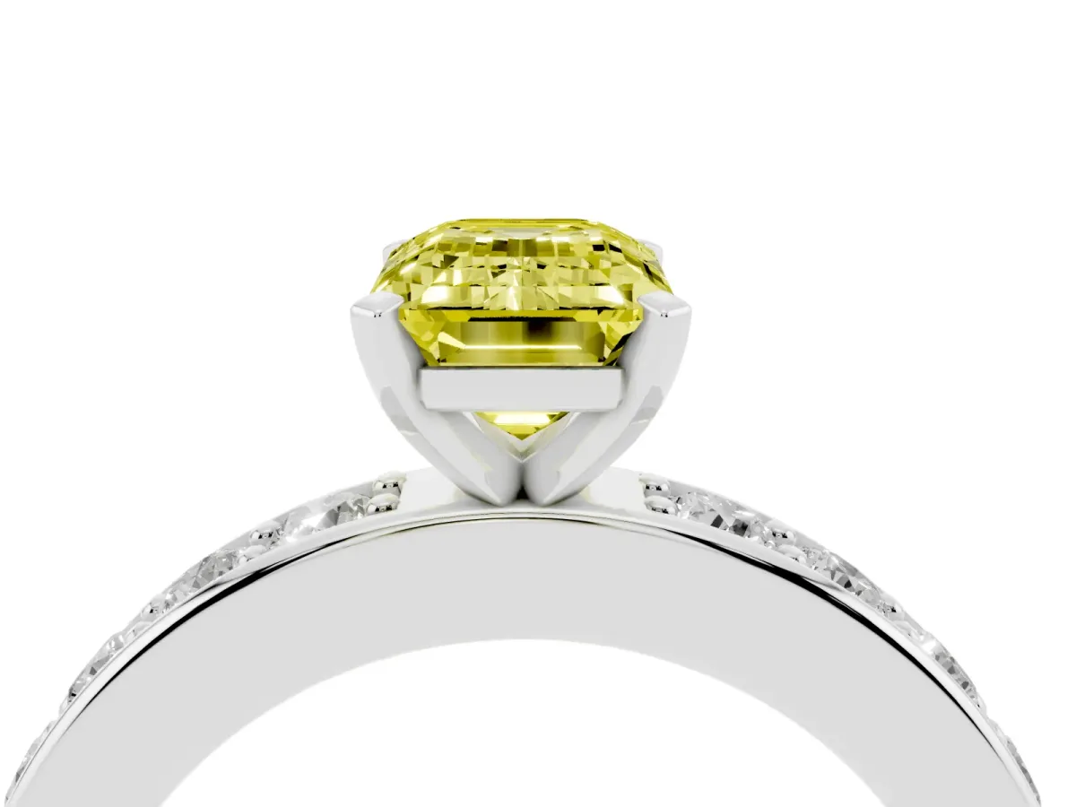 Fancy Yellow Emerald Cut Diamond Engagement Ring with Channel Set Round Band and Prong Setting Platinum