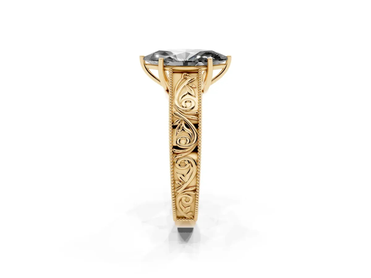 Fancy Black Marquise Cut Diamond Solitaire Ring with Engraved Band and Four-Prong Setting Yellow gold