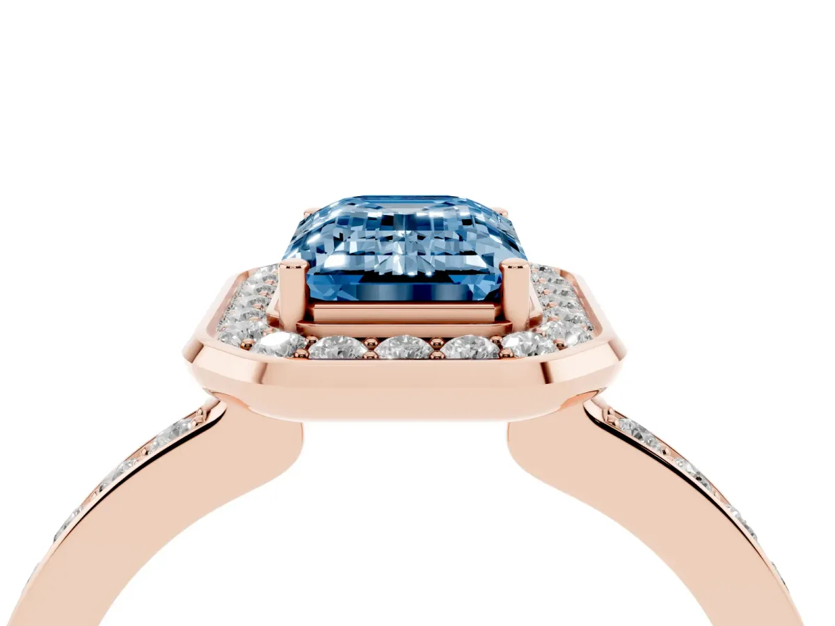 Fancy Blue Emerald Cut Diamond Halo Ring with Bezel Frame and Pavé Band Rose gold