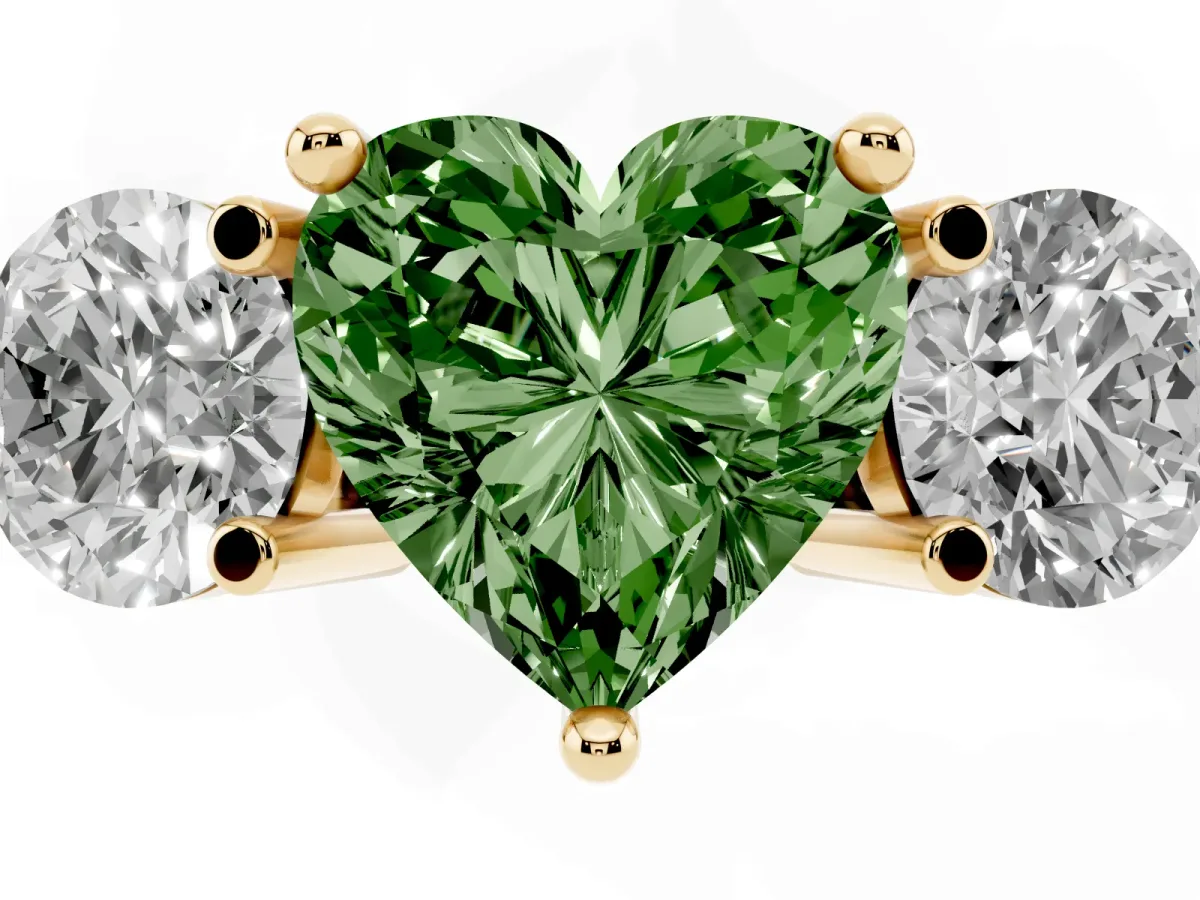Fancy Green Three-Stone Heart Cut Brilliant Cut Solitaire Ring with Prong Setting on a Classic Band Yellow gold