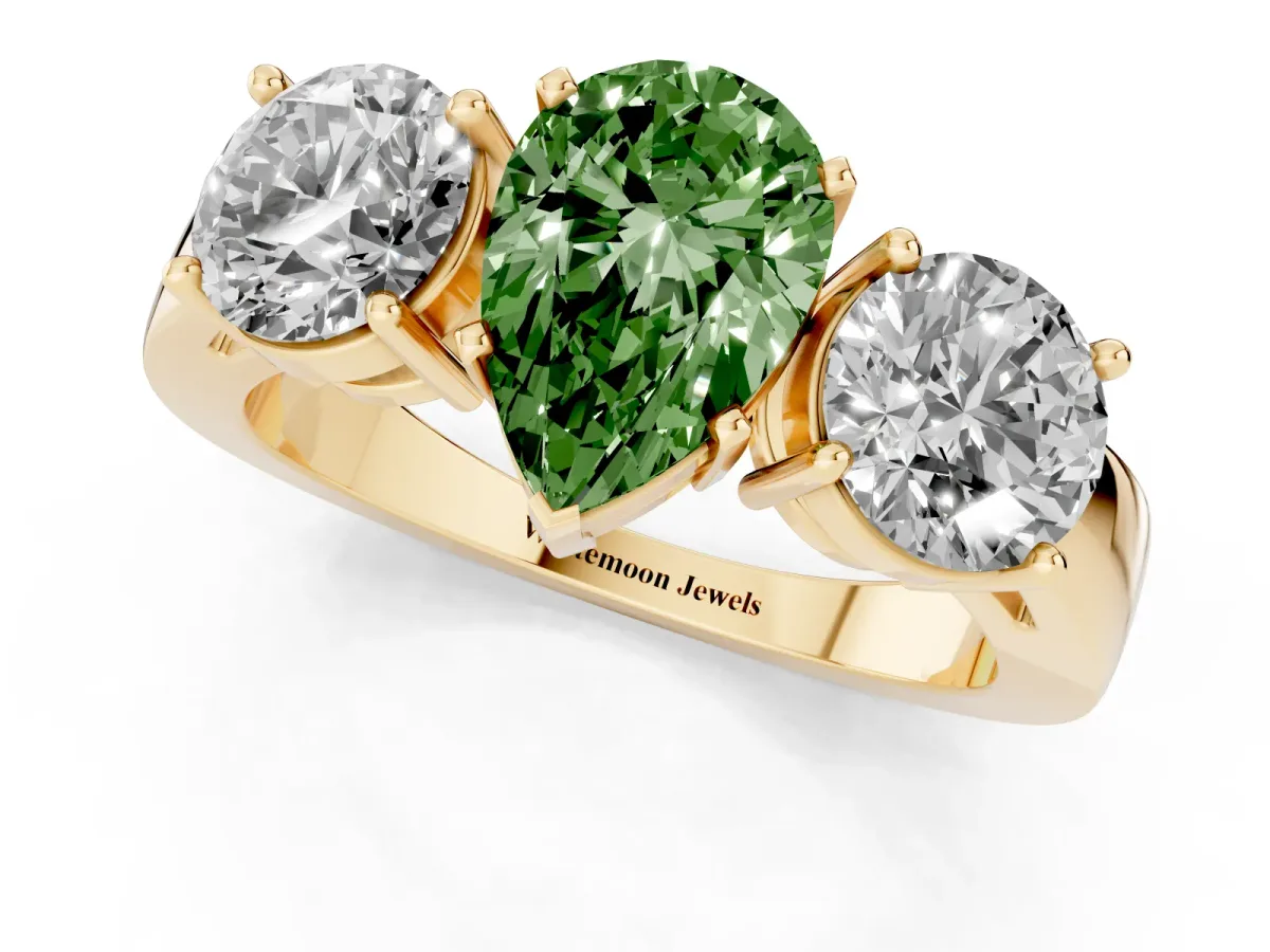 Fancy Green Three-Stone Pear Cut Diamond Ring with Round Side Stones, Classic Band, and Four-Prong Setting Yellow gold
