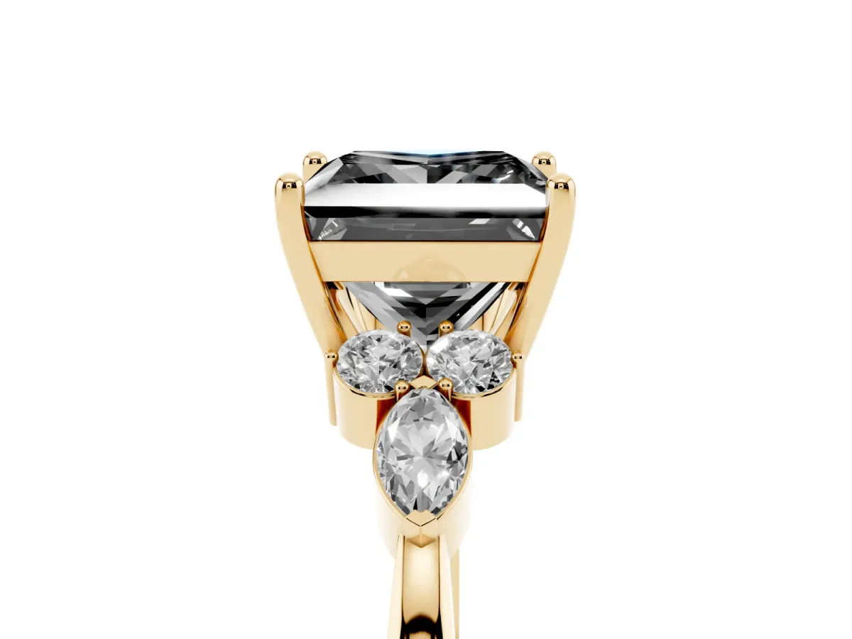 Fancy Black Princess Cut Brilliant Diamond Solitaire Ring with Pear Side Stones and Four-Prong Setting Yellow gold