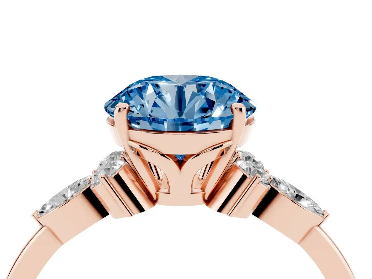 Fancy Blue Round Cut Brilliant Diamond Solitaire Ring with Pear Side Stones and Four-Prong Setting Rose gold