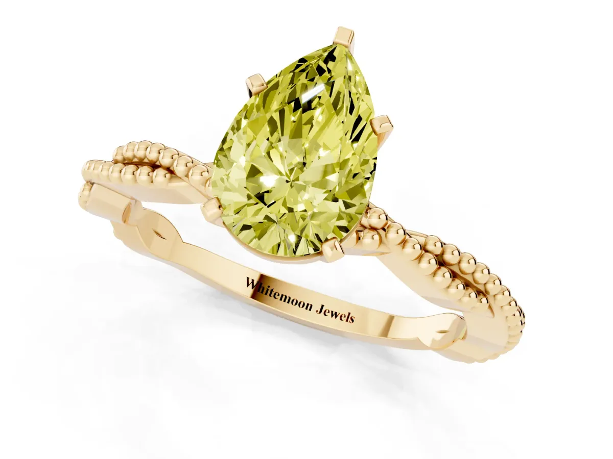 Fancy Yellow Pear Cut Solitaire Twisted Band with Bead Prong Setting Yellow gold