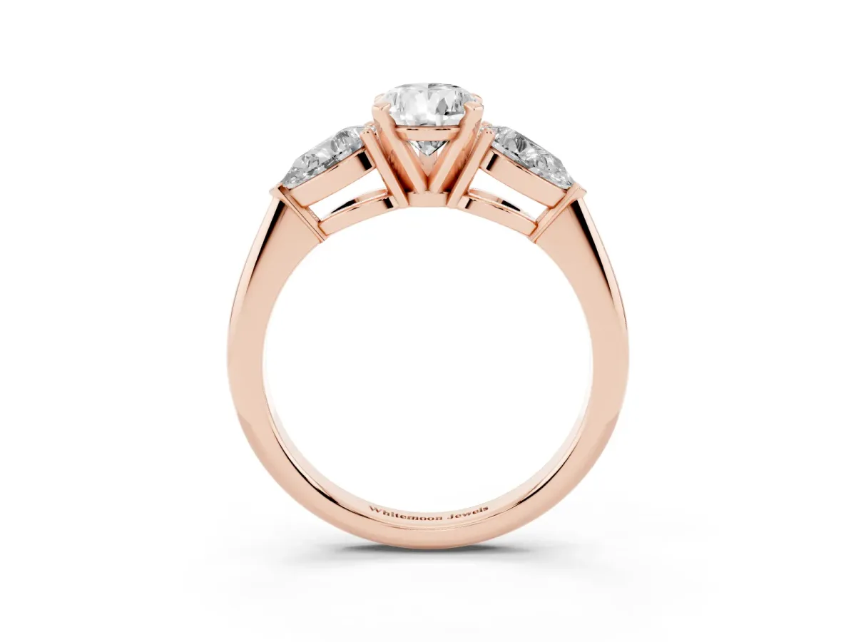 Three-Stone Pear Cut Diamond Ring with Pear Side Stones and Four-Prong Setting Rose gold