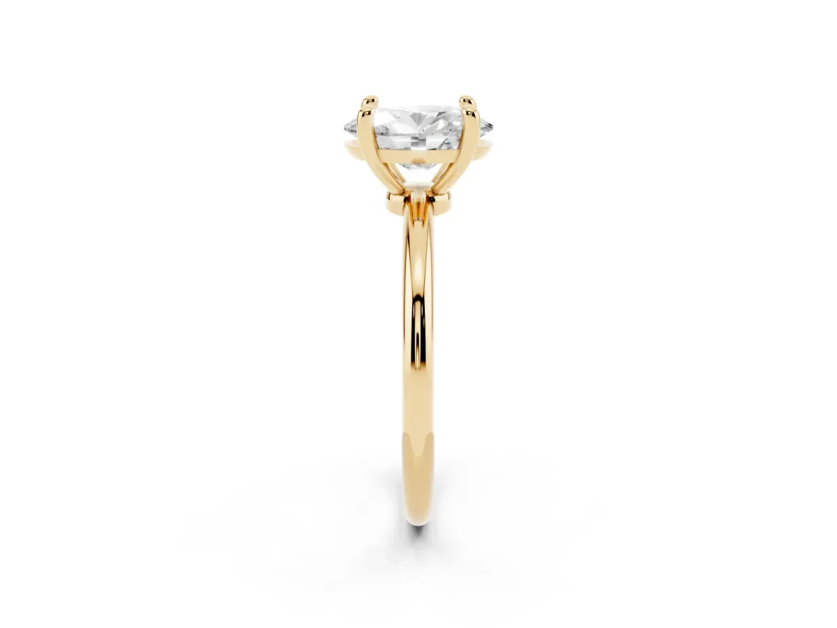 Oval Cut Solitaire Diamond Ring with 4-Prong Setting on a Classic Band Yellow gold