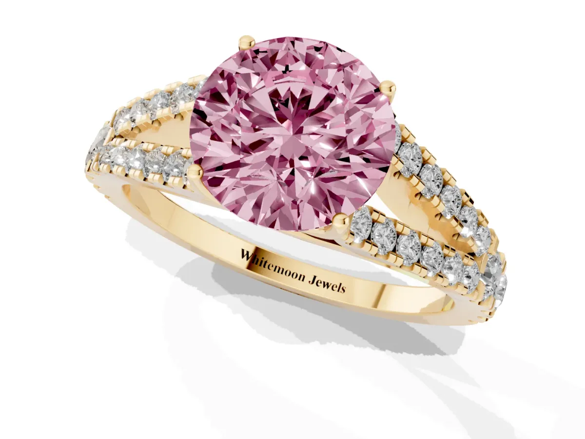 Fancy Pink Round Cut Diamond Split Shank Engagement Ring with Round Pavé and Prong Setting Yellow gold