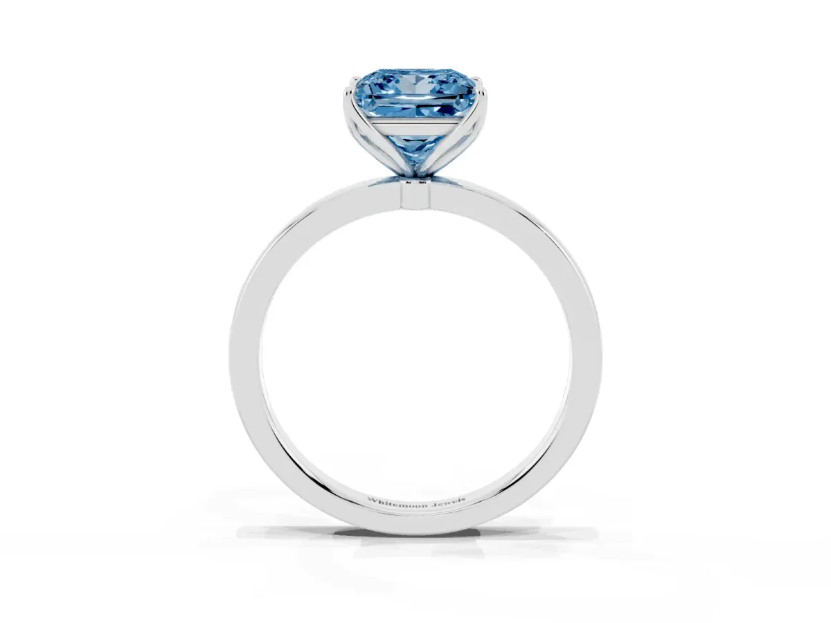 Fancy Blue Princess Cut Diamond Solitaire Ring with Thin Band and Prong Setting Platinum