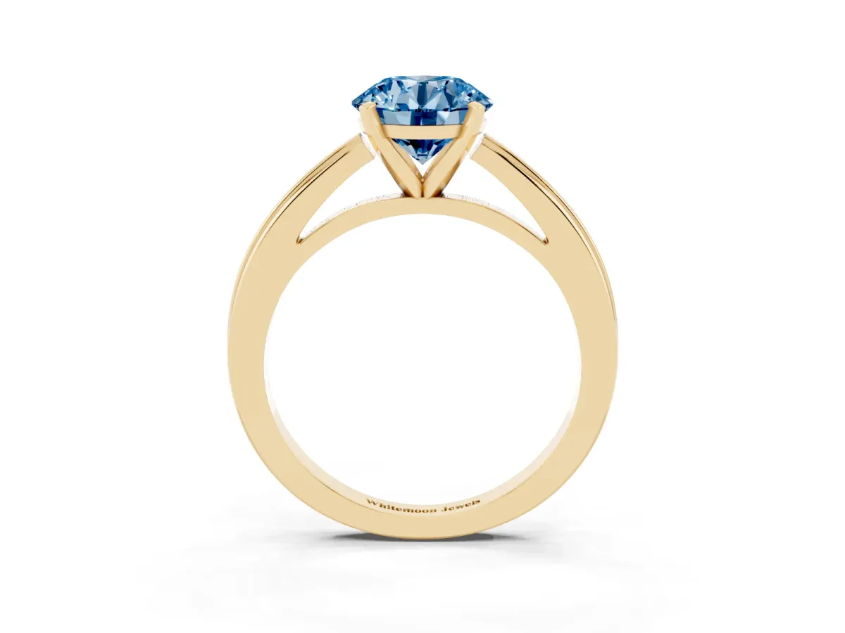 Fancy Blue Round Cut Solitaire Diamond Ring with Four-Prong Setting and Classic Band Yellow gold