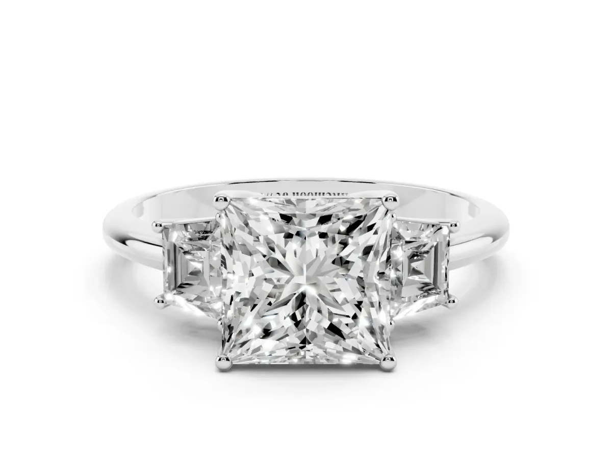 Princess Cut Diamond Three-Stone Ring with Trapezoid Side Stones and Prong Setting Platinum