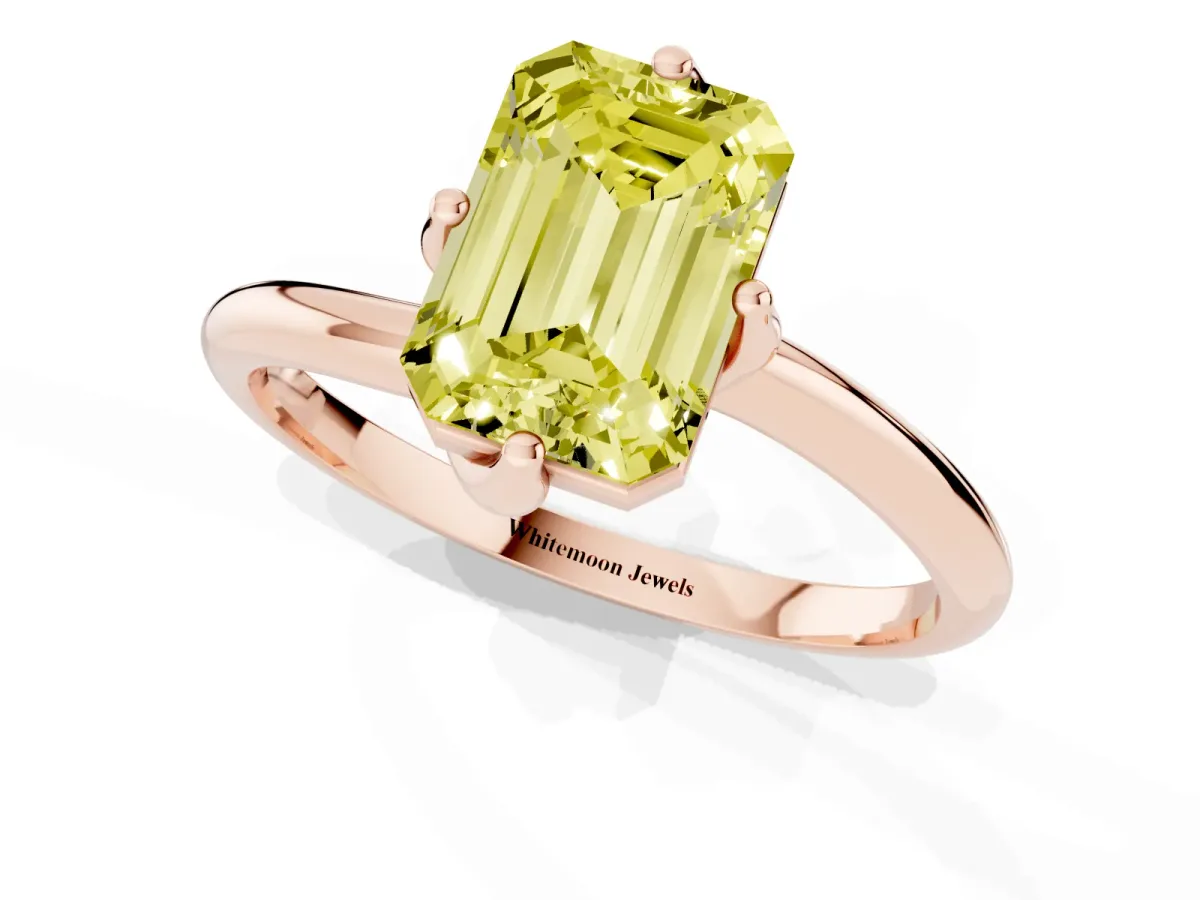 Fancy Yellow Emerald Cut Diamond Solitaire Engagement Ring with Four-Prong Setting and Classic Band Rose gold
