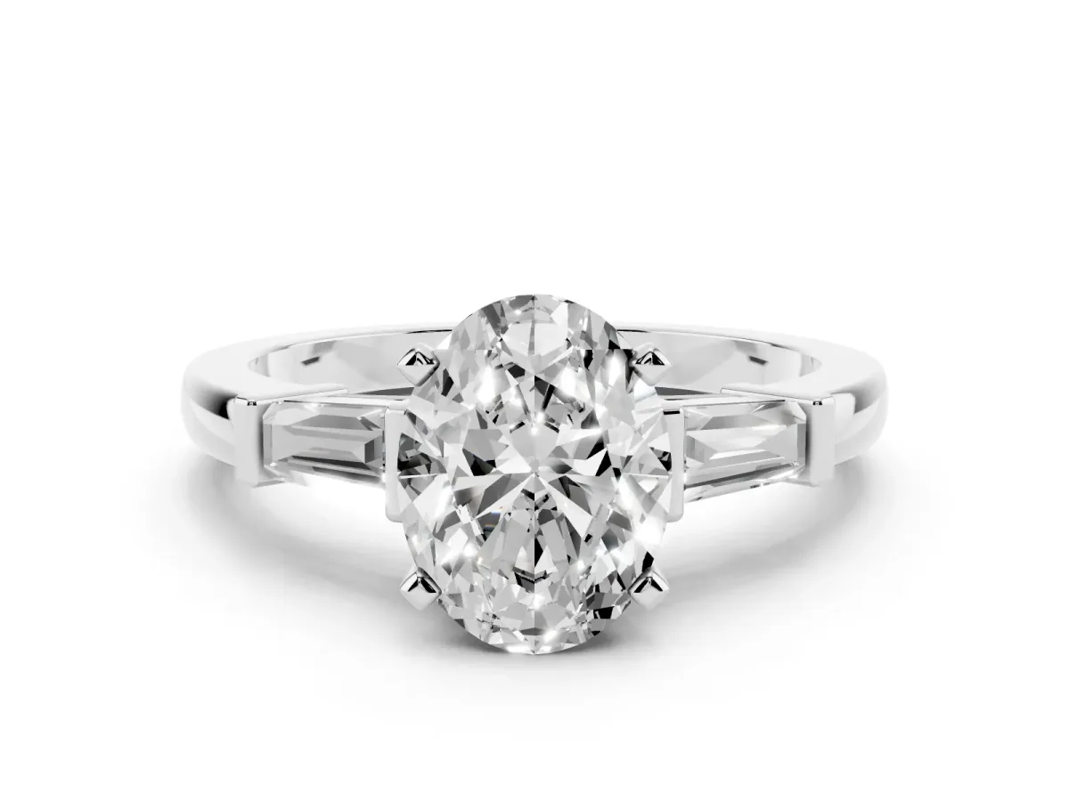 Oval Cut Cut Diamond Solitaire Ring with Tapered Baguette Accents and Four-Prong Setting Platinum