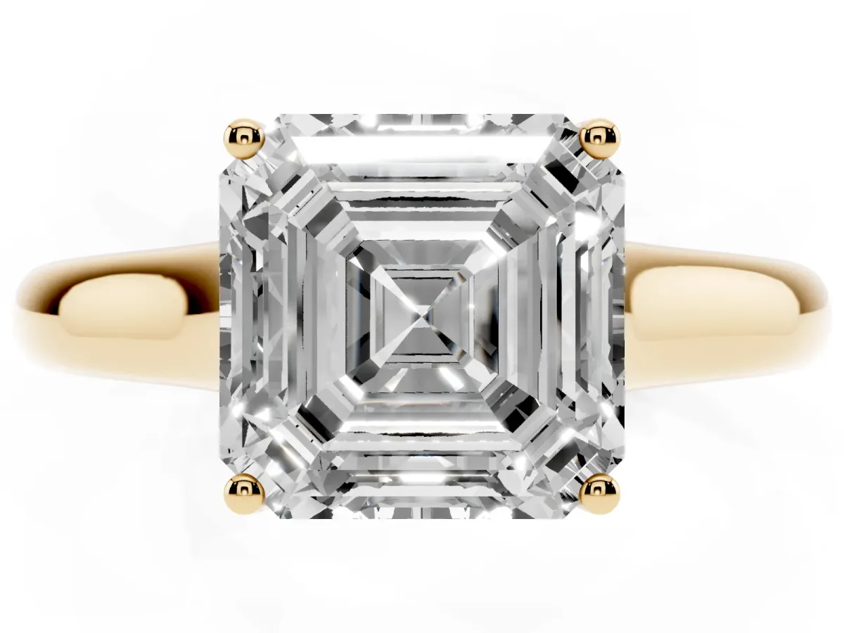 Asscher Cut Solitaire Engagement Ring with Tapered Band and Four-Prong Setting Yellow gold
