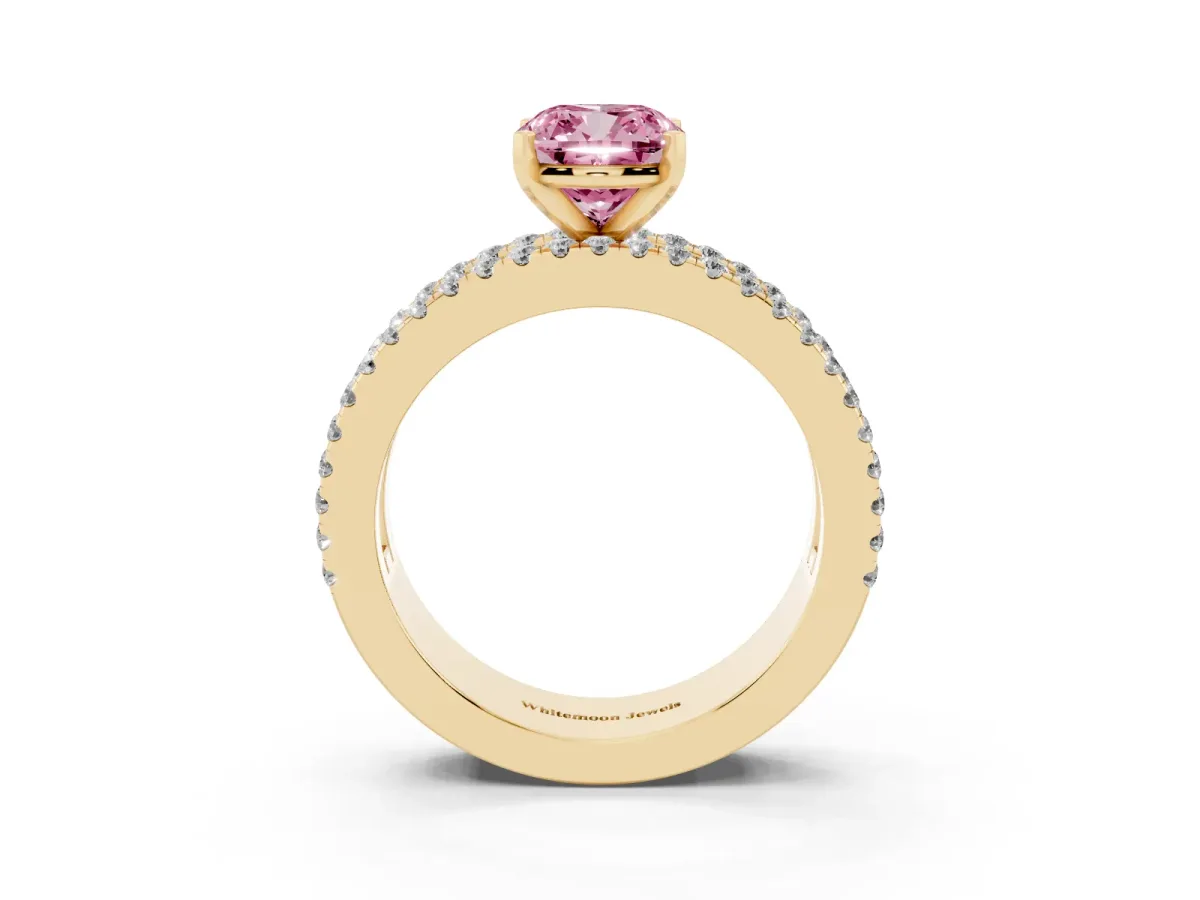 Fancy Pink Cushion Cut Diamond Solitaire Ring with Pavé and Channel Set Band Yellow gold