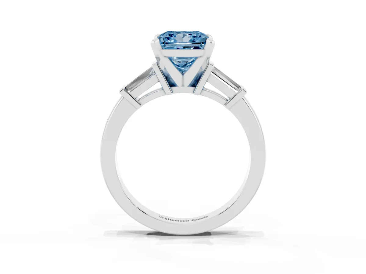 Fancy Blue Princess Cut Cut Diamond Solitaire Ring with Tapered Baguette Accents and Four-Prong Setting Platinum
