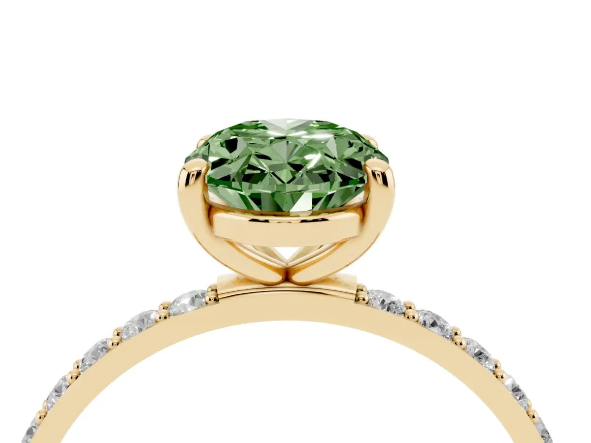 Fancy Green Oval Cut Diamond Solitaire Ring with Round Pavé Band and Prong Setting Yellow gold