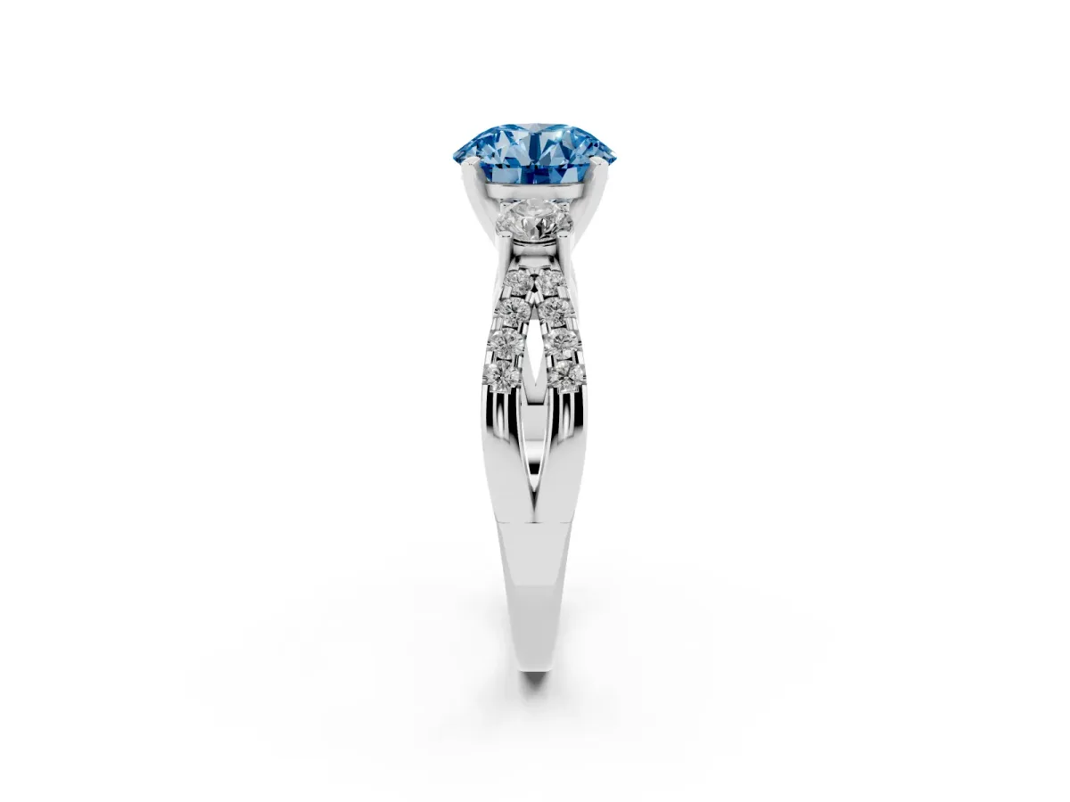 Fancy Blue Round Cut Diamond Three-Stone Ring with Pavé Split Shank and Four-Prong Setting White gold
