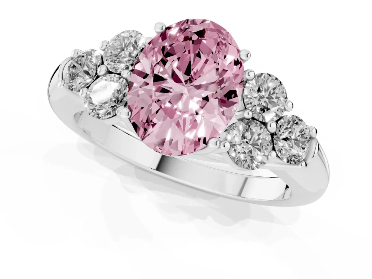 Fancy Pink Oval Cut Cut Diamond Cluster Ring with Round Accent Stones and Prong Setting on a Classic Band Platinum