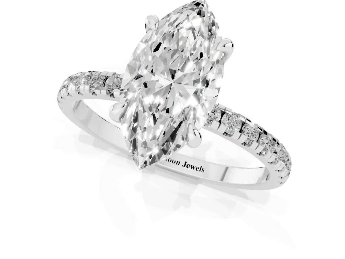 Marquise Cut Diamond Brilliant Solitaire Ring with Pavé Band and Four-Prong Setting Silver