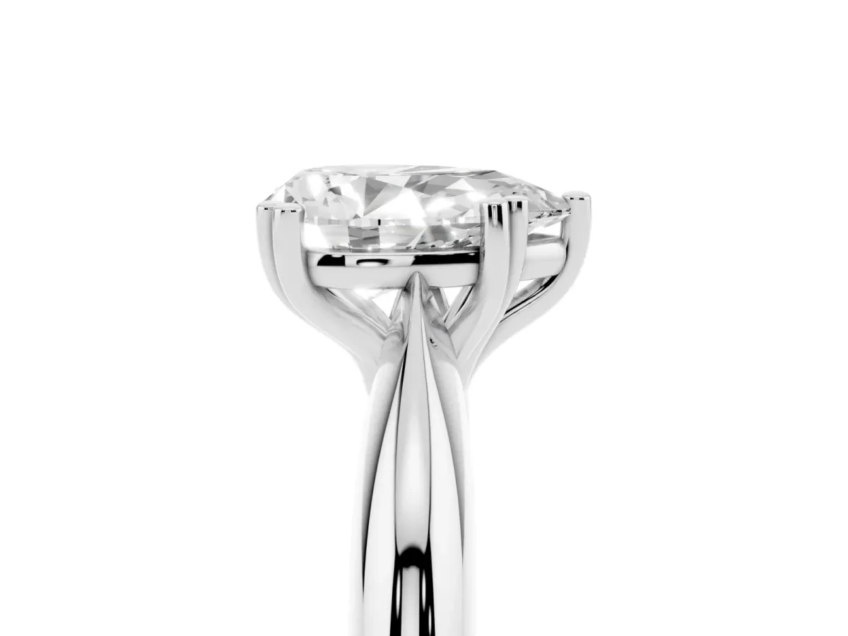 Pear Cut Cut Solitaire Engagement Ring with Tapered Band and Four-Prong Setting Platinum