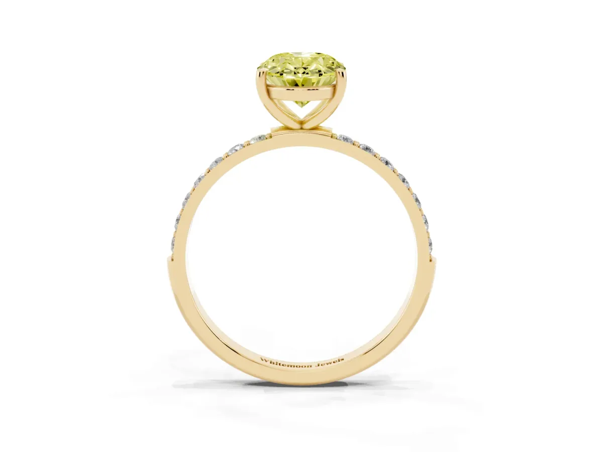Fancy Yellow Oval Cut Diamond Solitaire Ring with Round Pavé Shoulders and Prong Setting Yellow gold