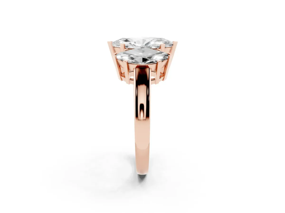 Three-Stone Marquise Cut Cut Diamond Ring with Channel Set Band and Four-Prong Setting Rose gold
