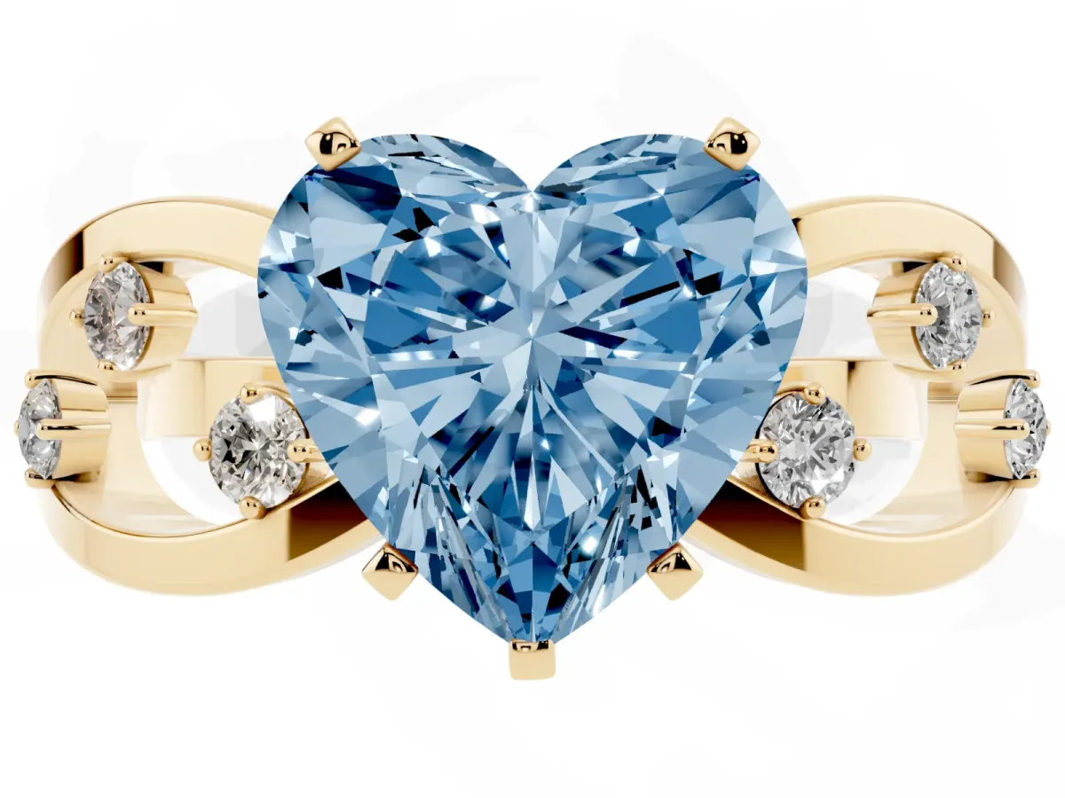 Fancy Blue Heart Cut Cut Solitaire Diamond with Side Stones on Criss-Cross Band and Four-Prong Setting Yellow gold