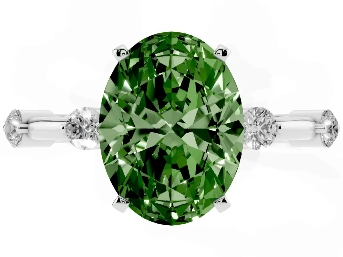 Fancy Green Oval Cut Solitaire Diamond Ring with Bezel Set Side Stones and Prong Setting Silver