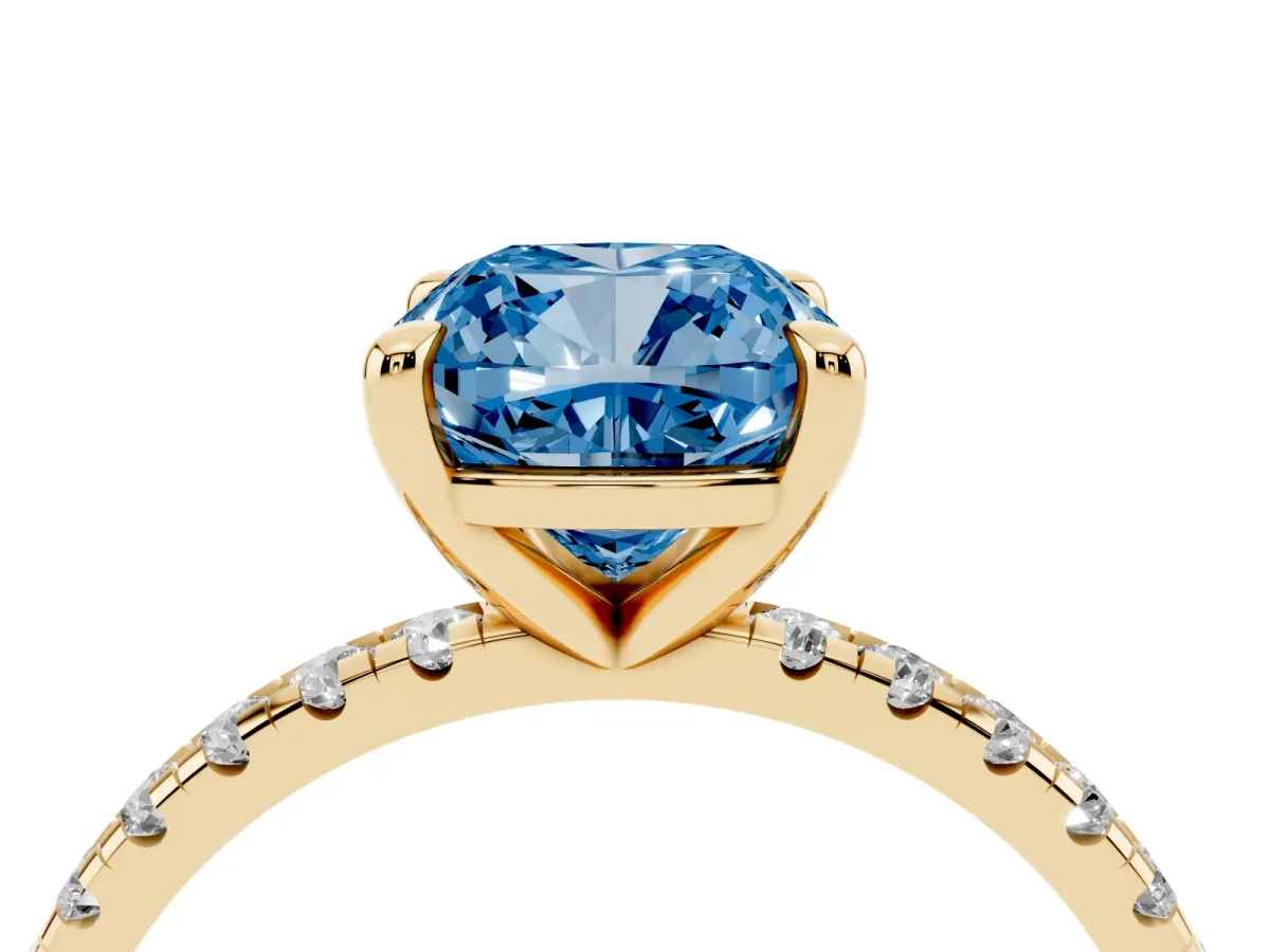Fancy Blue Cushion Cut Diamond Brilliant Solitaire Ring with Pavé Band and Four-Prong Setting Yellow gold