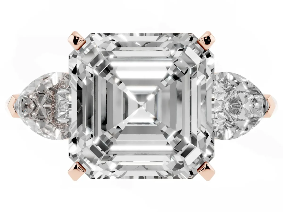 Three-Stone Asscher Cut Diamond Ring with Pear Side Stones and Four-Prong Setting Rose gold